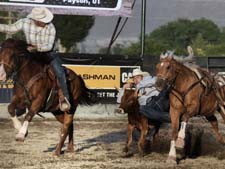 Gus Hanson competing on a dogging horse purchased from Goods Performance Horses